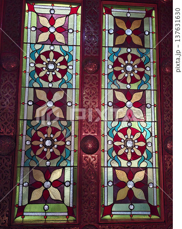 Old stained glass on the door inside saint Volodymyr cathedral in Kyiv, Ukraine 137631630