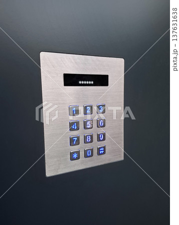 The parcel machine features a stainless PIN pad with a screen and keyboard 137631638