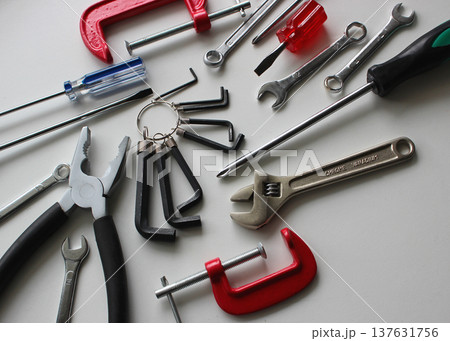Variety Mechanic Tools With Colorful Handles Isolated On White Surface Variety Mechanic Tools With Colorful Handles Isolated On White Surface 137631756