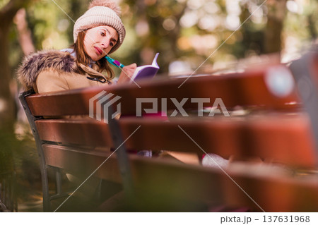 Woman with TCA writing diary focusing on mental health coping Woman with TCA writing diary focusing on mental health coping 137631968