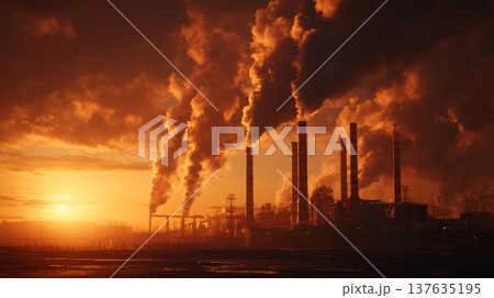 Captivating Sunset Over Industrial Factory with Smoke Stacks and Vibrant Sky Colors Captivating Sunset Over Industrial Factory with Smoke Stacks and Vibrant Sky Colors 137635195