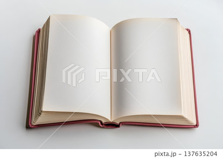 An Open Book on a White Surface Bathed in Soft Natural Light, Evoking a Sense of Calm and Reflection An Open Book on a White Surface Bathed in Soft Natural Light, Evoking a Sense of Calm and Reflection 137635204