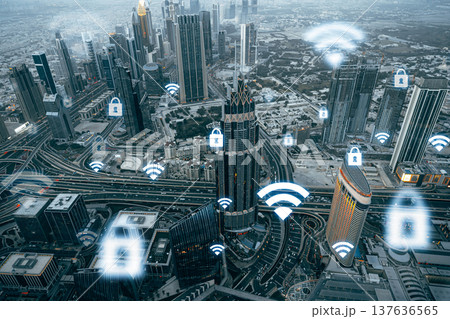 Digital connections above a cityscape in Dubai with wireless signals and security icons Digital connections above a cityscape in Dubai with wireless signals and security icons 137636565