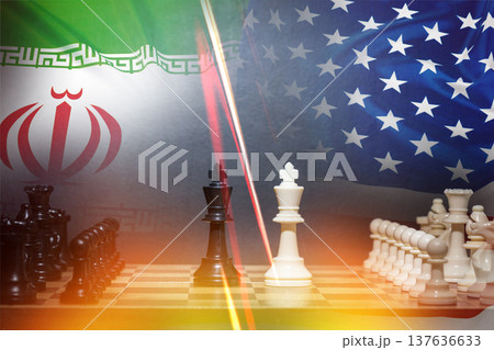 Conflict between Iran and USA represented through a chess game with flags in the background Conflict between Iran and USA represented through a chess game with flags in the background 137636633