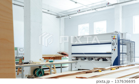 Workshop shows machinery and tools used for woodworking and crafting in a spacious area 137636695