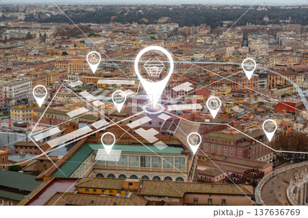 Overhead view of city with digital map markers for shops and services at sunset Overhead view of city with digital map markers for shops and services at sunset 137636769
