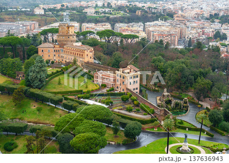 View of historical buildings and green landscape in Rome from high point on a cloudy day 137636943