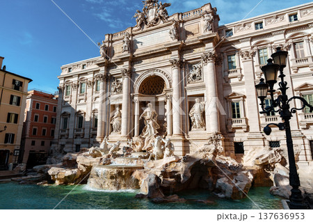 Tourists gather at Trevi Fountain in Rome during a sunny afternoon 137636953