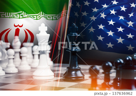 Conflict between Iran and USA shown as chess match with flags in background 137636962