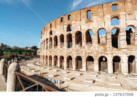 Historic Roman Colosseum under bright sky in Rome during daytime 137637006