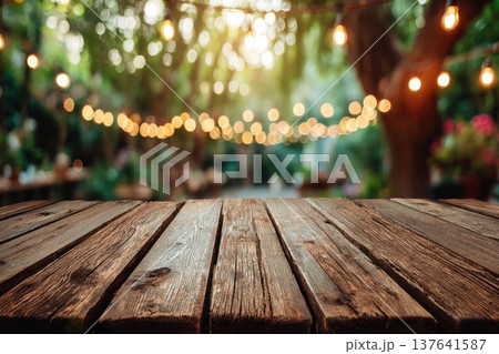 Rustic Wooden Surface with Soft Shadows in a Wide Panoramic Garden Background Rustic Wooden Surface with Soft Shadows in a Wide Panoramic Garden Background 137641587