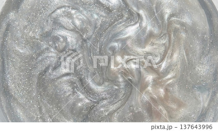 Swirled silver and white glossy metallic abstract background with seamless texture and pearly reflection. Silver swirl, white, metallic, abstract, seamless, glossy. 137643996