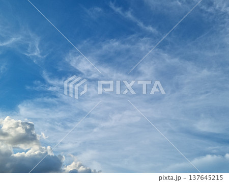 Blue sky and feathery clouds Blue sky and feathery clouds 137645215