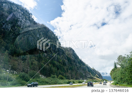 Highway in Hope  BC, Canada with cloud covered mountains in the background 137646016