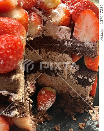 Rich, moist chocolate cake with a decadent, velvety texture and deep chocolate flavor. A perfect indulgence for dessert lovers, offering a satisfyingly sweet treat in every bite. 137647280