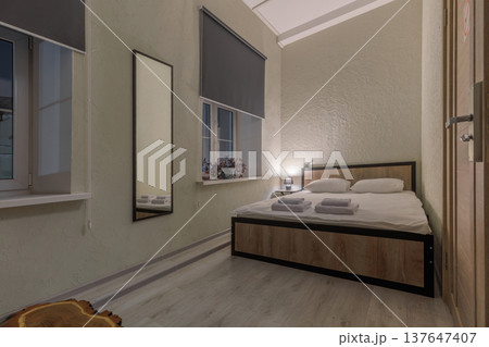 Compact Budget Hotel Room with Double Bed and Modern Amenities Compact Budget Hotel Room with Double Bed and Modern Amenities 137647407