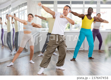 Group of people dancing modern dances 137647458
