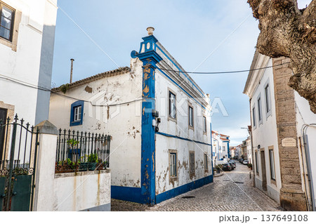 Ericeira, Portugal - Mar 03, 2026: Traditional white houses with blue stripes in the streets of Ericeira in Portugal Ericeira, Portugal - Mar 03, 2026: Traditional white houses with blue stripes in the streets of Ericeira in Portugal 137649108