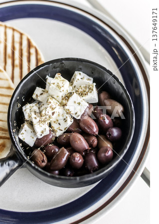 marinated olives and feta cheese tapas snack at outdoor restaurant in mykonos greece 137649171