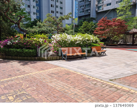 It's a park inside an apartment complex. It's a park inside an apartment complex. 137649369