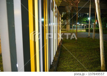 Urban Park Fence and Grass Landscape at Night Urban Park Fence and Grass Landscape at Night 137649557