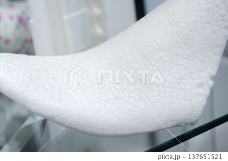 Foam plastic shoe mold. Products made from foamed polymers expanded polypropylene EPP and expanded polystyrene EPS. Model of dense and lightweight material, universal foam. New modern technologies Foam plastic shoe mold. Products made from foamed polymers expanded polypropylene EPP and expanded polystyrene EPS. Model of dense and lightweight material, universal foam. New modern technologies 137651521