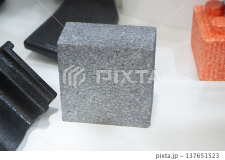 Products made from foamed polymers expanded polypropylene EPP and expanded polystyrene EPS. Model of dense and lightweight material, universal foam. New modern technologies. Industrial manufacturing Products made from foamed polymers expanded polypropylene EPP and expanded polystyrene EPS. Model of dense and lightweight material, universal foam. New modern technologies. Industrial manufacturing 137651523