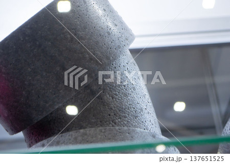 Products made from foamed polymers expanded polypropylene EPP and expanded polystyrene EPS. Model of dense and lightweight material, universal foam. New modern technologies. Industrial manufacturing 137651525
