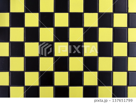 Yellow ceramic tile background. Old vintage ceramic tiles in yellow to decorate the kitchen or bathroom Yellow ceramic tile background. Old vintage ceramic tiles in yellow to decorate the kitchen or bathroom 137651799