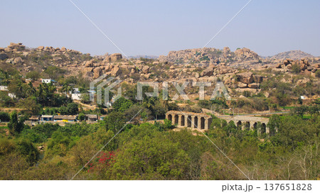 Tungabhadra Bukka Aqueduct Hampi, archaeological site between Hampi Hippie island and Sanapur, India. Tungabhadra Bukka Aqueduct Hampi, archaeological site between Hampi Hippie island and Sanapur, India. 137651828