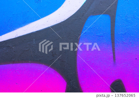 Bold abstract graffiti on urban wall, vibrant pink and blue gradient art Bold abstract graffiti on urban wall, vibrant pink and blue gradient art 137652065