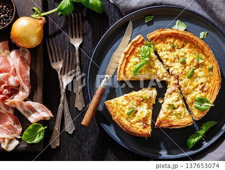 Quiche Lorraine with bacon, cheese and fresh basil Quiche Lorraine with bacon, cheese and fresh basil 137653074