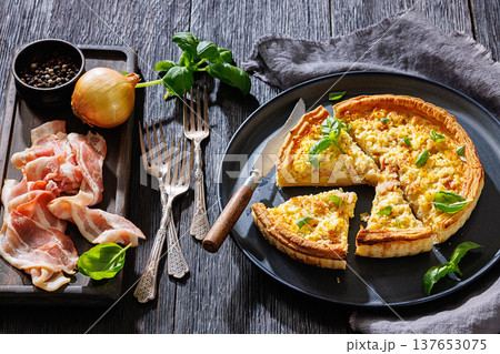 Quiche Lorraine with bacon, cheese and fresh basil Quiche Lorraine with bacon, cheese and fresh basil 137653075