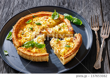 Quiche Lorraine with bacon, cheese and fresh basil Quiche Lorraine with bacon, cheese and fresh basil 137653082