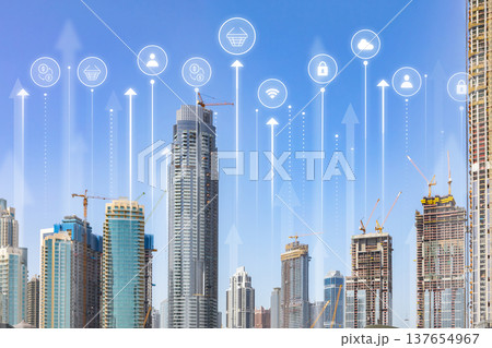 Urban development and technology rise in city skyline during clear day 137654967