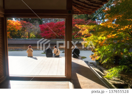 Tourist people view rock garden Ryoan-ji temple in fall, Kyoto Tourist people view rock garden Ryoan-ji temple in fall, Kyoto 137655528