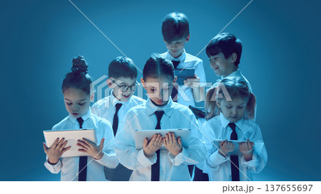 Children using tablets on studio background 137655697