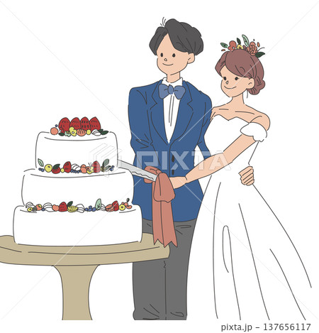 ケーキ入刀をする新郎新婦 137656117