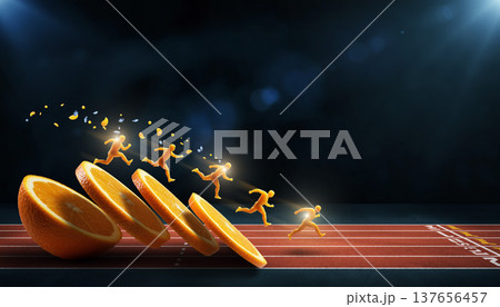 Energy sports competition with oranges and runners on a track in a creative concept space 137656457