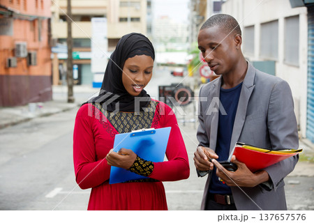 portrait of a man and a businesswoman. 137657576