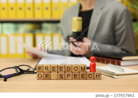 Inspiring discussion on freedom of speech unfolds at a vibrant office desk during a lively afternoon 137657661