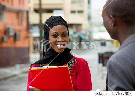 close up of muslim female, smiling. close up of muslim female, smiling. 137657908