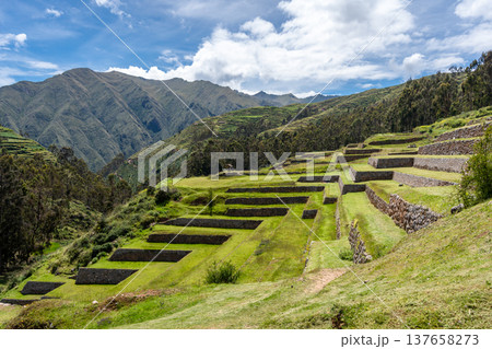Inca archaeological site of Chinchero with terraces and mountain backdrop Inca archaeological site of Chinchero with terraces and mountain backdrop 137658273