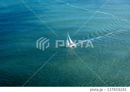 Sailboat gliding through the bay near Golden Gate Bridge, San Francisco 137658281