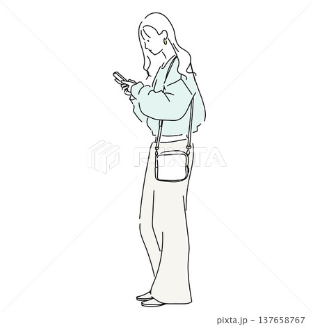 ミントカラーの春ニットコーデ スマホを見る女性の全身ファッションイラスト 137658767