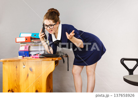 Happy secretary business woman in office Happy secretary business woman in office 137658926