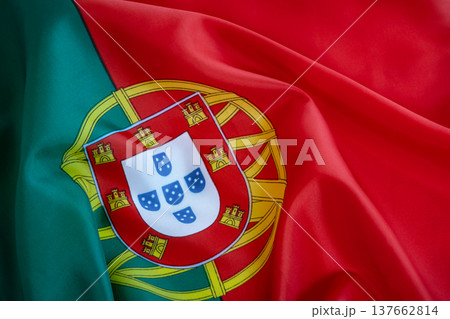 Portuguese flag, showcasing the vibrant green and red fields with the national coat of arms 137662814