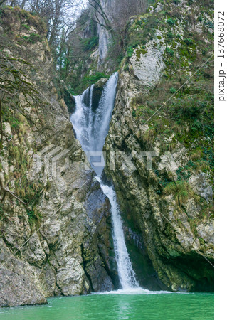 Beautiful waterfall in the mountains, Krasnodar region, Russia Beautiful waterfall in the mountains, Krasnodar region, Russia 137668072