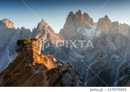 Alpine landscape of Cadini di Misurina with rugged mountain range during sunset in Dolomites, Italy 137670892