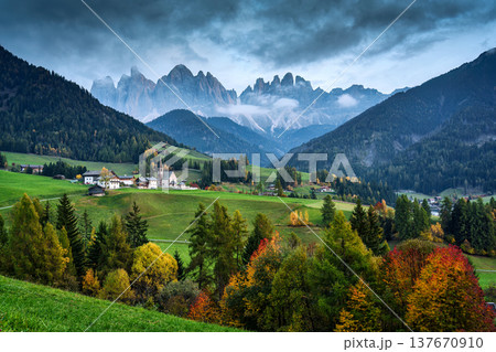 Scenic landscape of Santa Maddalena church with Odle mountain range in Val di Funes, Dolomites, Italy 137670910
